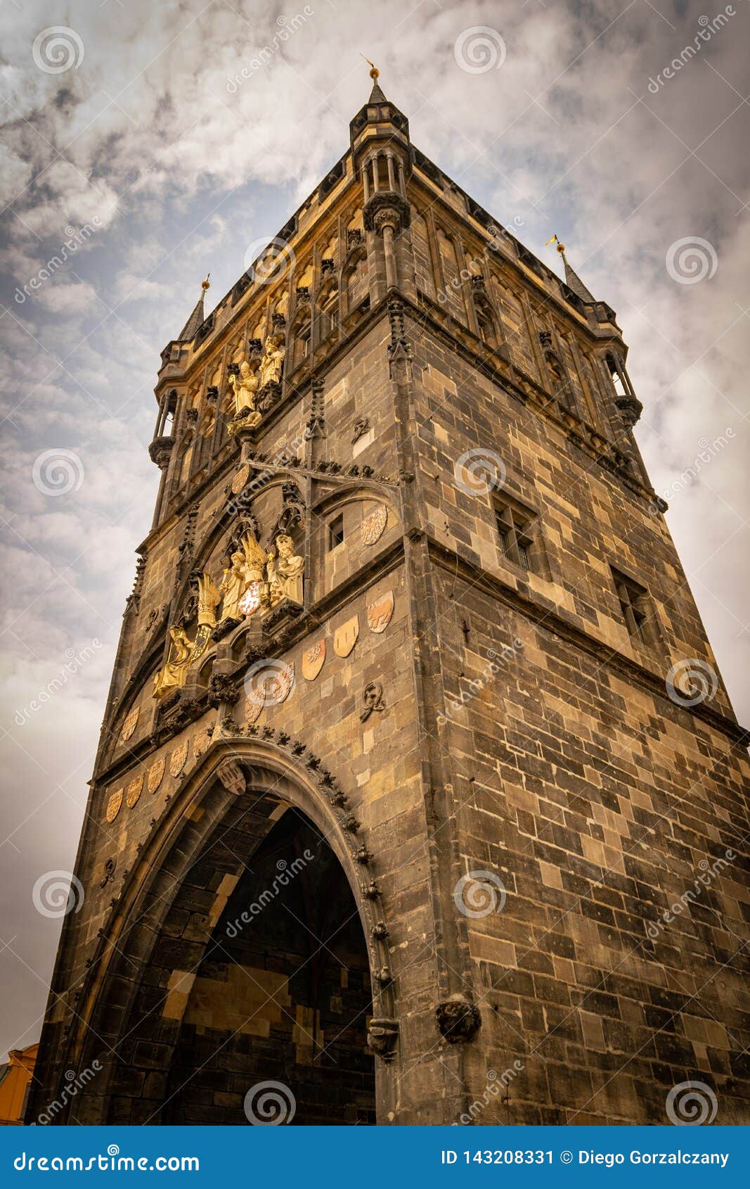 the imponent powder tower in prague from below